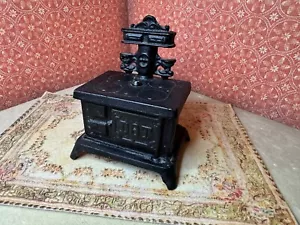 Vintage Miniature Cast Iron DOT Stove Coin Bank Cook With Cash 3.5 x 4 inch - Picture 1 of 11