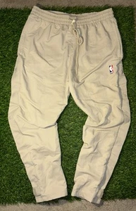 Pantalones de calentamiento Nike X Fear Of God NBA de nailon L 'String' beige CU4684-271 - Imagen 1 de 7