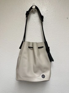 Vince Camuto Lorin Hobo Bucket Shoulder Bag, Leather w/ Drawstring Tassels Beige - Picture 1 of 17