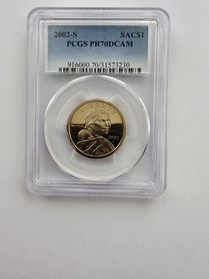  PR70 DCAM 2002 SACAGAWEA DOLLAR GRADED PCGS SAC 1$ CLAD COIN   - Image 1 of 4