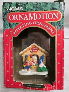 Vintage Noma Ornamotion Weihnachtsmann Bäckerei drehbarer Weihnachtsschmuck 1989 - Bild 1 von 10
