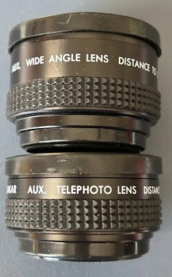 Lote de 2 teleobjetivos y lentes de cámara gran angular Sakar hechos en Japón usados en excelente estado con bolsa Foto 1 de 4