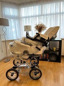 Baby Style pram,Used only once its stil in  very good condition with a car seat 