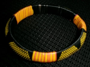 Woven Tuareg Bracelet Orange Black Yellow 1/2" x 3" in diameter OF1 - Picture 1 of 2