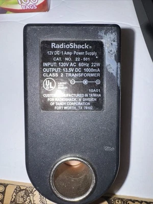 Fuente de alimentación portátil Radioshack CA a CC convertir 120V a 12V enchufe interno para automóvil Foto 1 de 3
