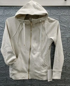 New Lululemon Scuba Full-Zip Hoodie Heathered Light Ivory/Gold Sz 12 - Picture 1 of 7