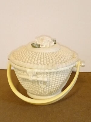 Nantucket style basket ivory  3" tall resin. Says"Cape Cod" under flower on top. - Image 1 of 4