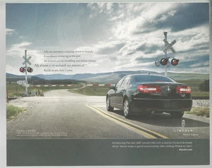 2007 LINCOLN MKZ advertisement, Lincoln print ad, at RR crossing - Imagen 1 de 3