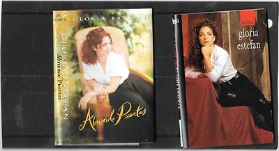 2 CASSETTES GLORIA ESTEFAN-ABRIENDOPUERTAS & EXITOS DE-  VG CON - Image 1 of 2