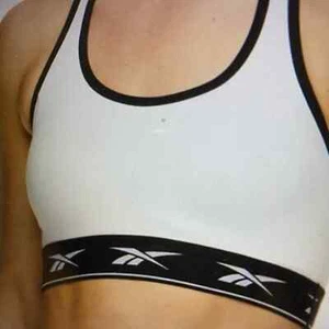 Reggiseno sportivo senza cuciture Reebok Stellar Stark bianco/nero bordo racerback medio nuovo con etichette - Foto 1 di 7