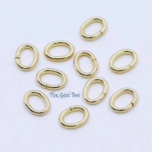 3MMx4MM 22 gauge 14k Solid Yellow Gold Oval Open Jump Rings (10) - Picture 1 of 9