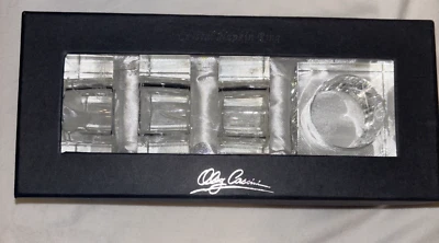 Oleg Cassini Signed Clear Crystal Round Napkin Rings Damaged Box Set Of 4 - Image 1 of 4