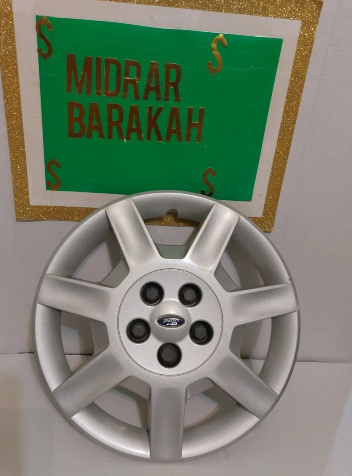 (1) Cubierta de rueda tapacubos Ford Taurus 2003-2007 16" OEM USADA PLATEADA #5F13-1130-AA  Foto 1 de 4