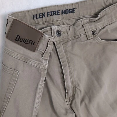 Pantalones de mezclilla Duluth Flex Fire beige para hombre 38x32 ajuste estándar spandex elástico Foto 1 de 4