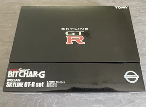 Tomy Tomica Bit Char-G Nissan GTR Set Micro RC Auto - Nuovo e Sigillato - Foto 1 di 7