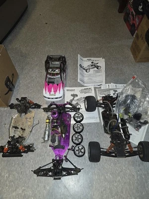 Vintage Nitro RC Parts Lot USED TEAM LOSI XXX DURATRAX EVADER MANUALS  - Image 1 of 4
