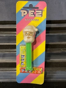 Pez Misfit Santa, Tan Head, Green Stem- Mint on Striped Euro Card - Picture 1 of 4