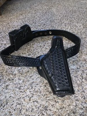 "Dutyman 1921 32"" con funda Safariland Thumbsnap Glock17 y bolsa Mag modelo 079" Foto 1 de 4