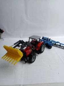 TIM/SIKU MASSEY FERGUSON MIT SCHEIBENPFLUF 1:32 - Bild 1 von 8
