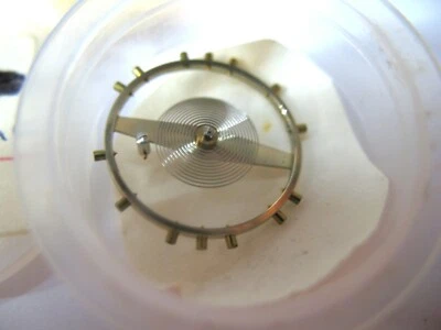 VALJOUX 5,551,555,562  BALANCE COMPLETE FLAT HAIRSPRING INCABLOC PART 721 - Image 1 of 3