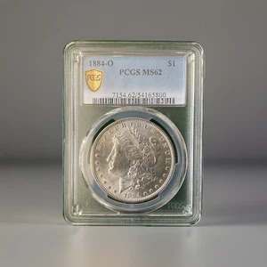 1884 O Silver Morgan Dollar MS 62 ,   PCGS Gold Shield - DJ - Picture 1 of 2