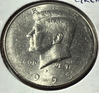 1995 P Kennedy Half Dollar Obverse Struck Thru Grease - Lot 138 - Image 1 of 4