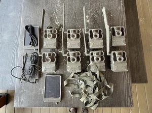 8 Reveal Cell Cameras W/ Solar Panels & Straps - Picture 1 of 9