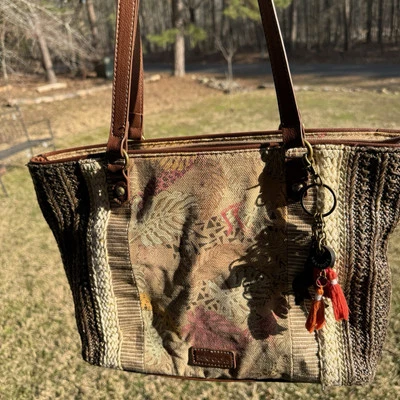 Bolso de mano Sakroot Meadow para mujer con dije Foto 1 de 4