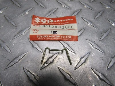 1977-1997 SUZUKI SP TS GN GS Modelos OEM Faros Soporte Muelle 35128-29611 Foto 1 de 4