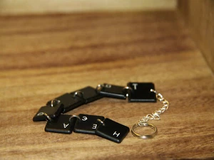 A&A UNIQUE - HEADSHOT - HANDMADE KEYRING MADE WITH USED KEYCAPS - UK SELLER - Picture 1 of 4