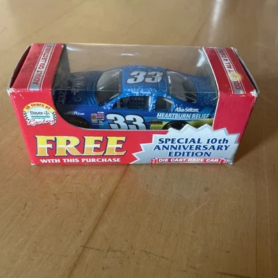 Team Caliber Bayer 2002 décimo aniversario fundido a presión #33 coche de carreras azul, Tony Raines Foto 1 de 4