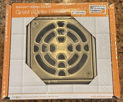 Kit de drenaje de ducha Schluter Systems Kerdi - Rejilla de 4 pulgadas (KD4GRKECG) acabado dorado Foto 1 de 3