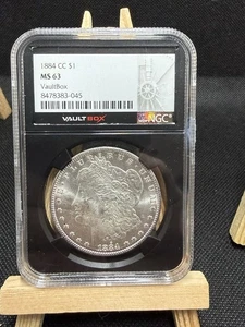 1884-CC Morgan Silber Dollar 1 $ NGC MS63 VaultBox Mosaik  - Bild 1 von 4