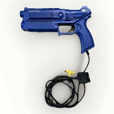 Pistola de luz azul Nyko (PS-80040-E09) Super Cobra para PS1/PS2 veja descrição  - Imagem 1 de 4
