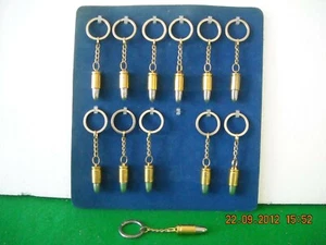 PORTACHIAVI PROIETTILE PALLOTTOLA ORO ARGENTO ANNI '80 - Picture 1 of 1