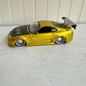 Jada Toys Import Racer 1:24 Toyota Supra Oro Gold - Picture 1 of 7