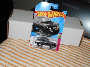 RUOTE CALDE SERIE ANNI 80 1988 JEEP WAGONEER GRIGIO/NERO BELLO!!!! - Foto 1 di 1