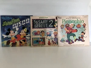 A Set Of Three Disney Vinyls. Mickey Disco, Sesame Street, And Pinocchio - Picture 1 of 4