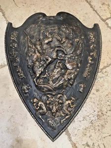 ANTIQUE VINTAGE LARGE IRON METAL WALL SHIELD BATTLE SCENE MEN W/ HORSES DETAILED - Picture 1 of 9