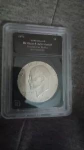 Eisenhower uncirculated silver dollar - Picture 1 of 4