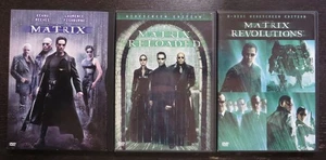 The Matrix Trilogy DVD Set - Reloaded & Revolutions - Reeves, Fishburne, Moss ++ - Picture 1 of 2