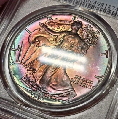 1987 American Silver Eagle PCGS MS66 Rainbow Toned Key Date 1oz .999 (8746) - Image 1 of 4