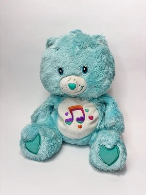 Peluche Care Bears Fluffy & Floppy Heart Song 12”, buen estado Foto 1 de 4