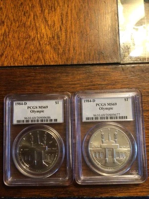 (2) 1984 D $1 Olympic Silver Dollars Los Angeles PCGS MS69 - Image 1 of 2
