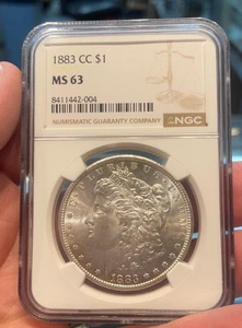 1883 CC MS63 NGC $1 Box 105 - Picture 1 of 2