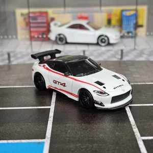 Nissan Z GT4 2024 Hot Wheels Premium Car Culture Race Day 2023 Real Riders Nismo - Imagen 1 de 8