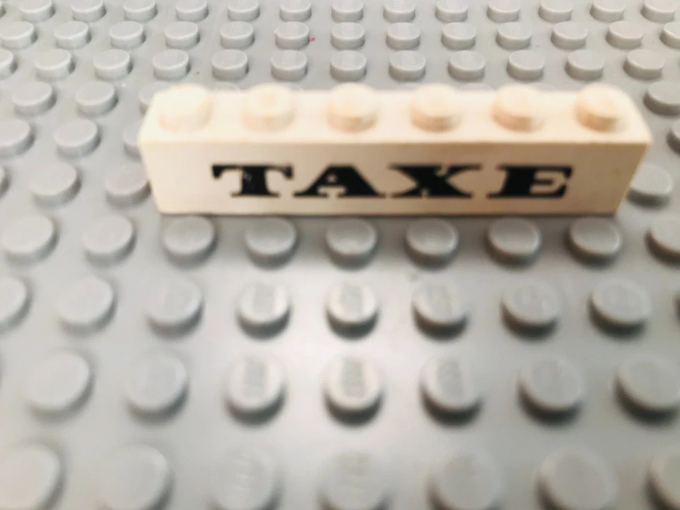 LEGO Baustein bedruckt 3009 px31 TAXE weiß 1x6 System City Hausbau Stadt - Bild 1 von 1
