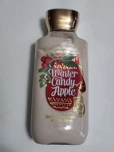 Bath & Body Works lozione idratante mela caramelle invernali burro di karitè e vitamina E 8 oz - Foto 1 di 2