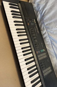 Yamaha Portatone PSR-31 Keyboard PCM STEREO 61 Tasten AUTO BASS schwarz VINTAGE 1986 - Bild 1 von 12