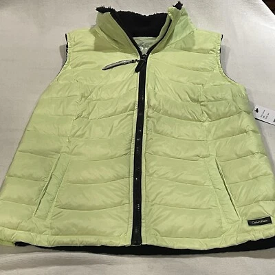 Chaleco acolchado de piel acolchada premium amarillo Calvin Klein para mujer. Foto 1 de 4